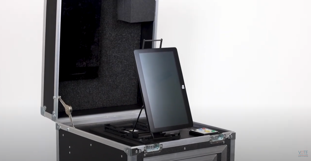 Thumbnail image from a BOE YouTube video. It shows a slightly zoomed in image of the ClearCast ADA voting machine